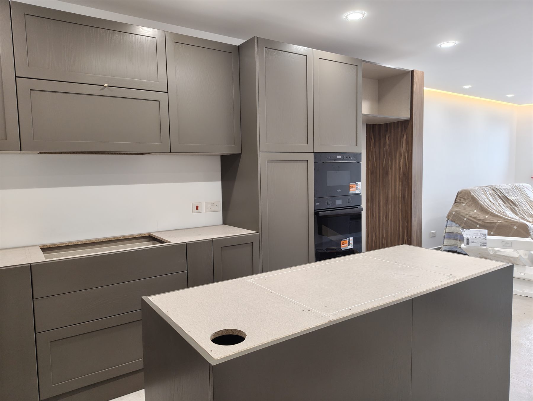 Custom kitchen units with stone worktop
