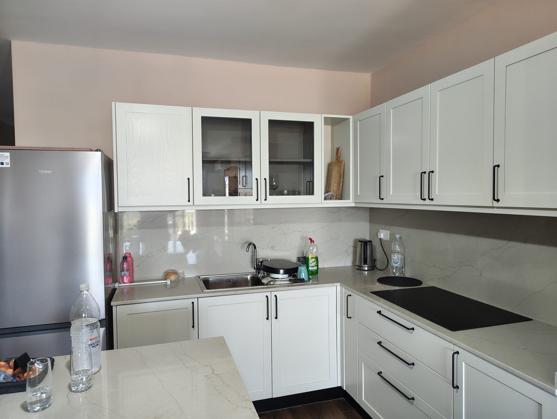 Cream shaker kitchen with island seating