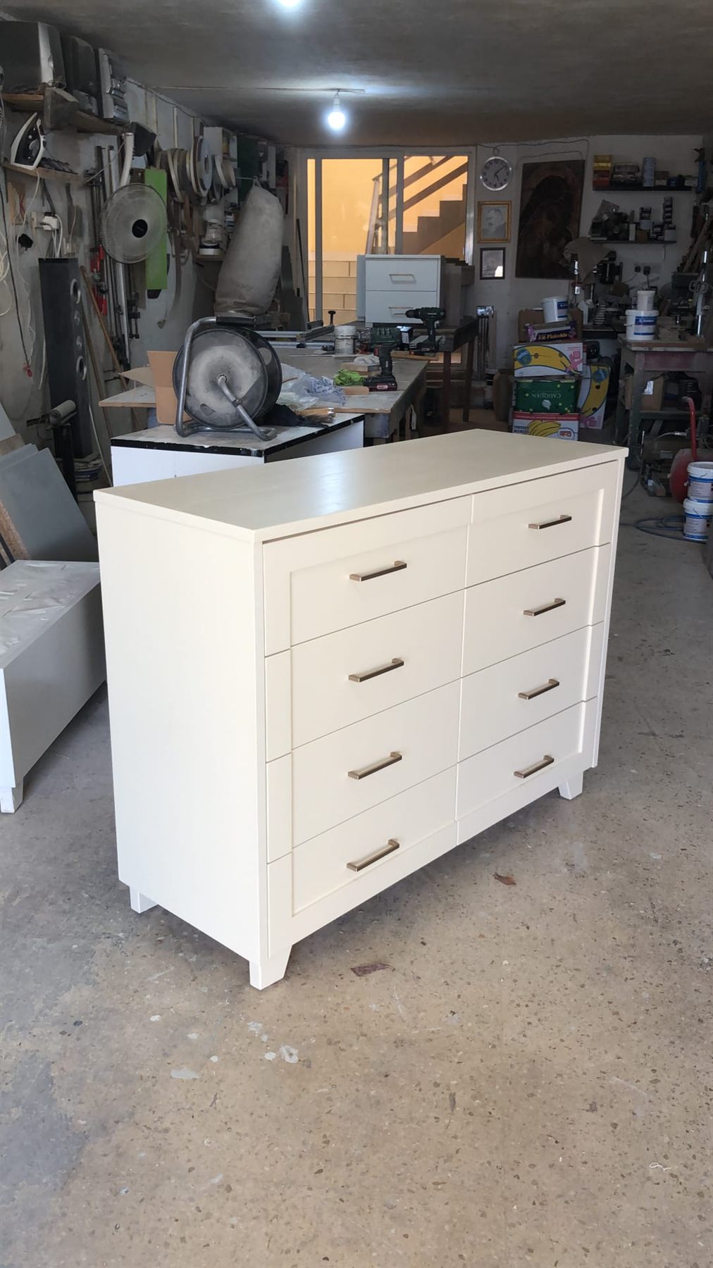 A finished chest of drawers in Dean Paul's workshop