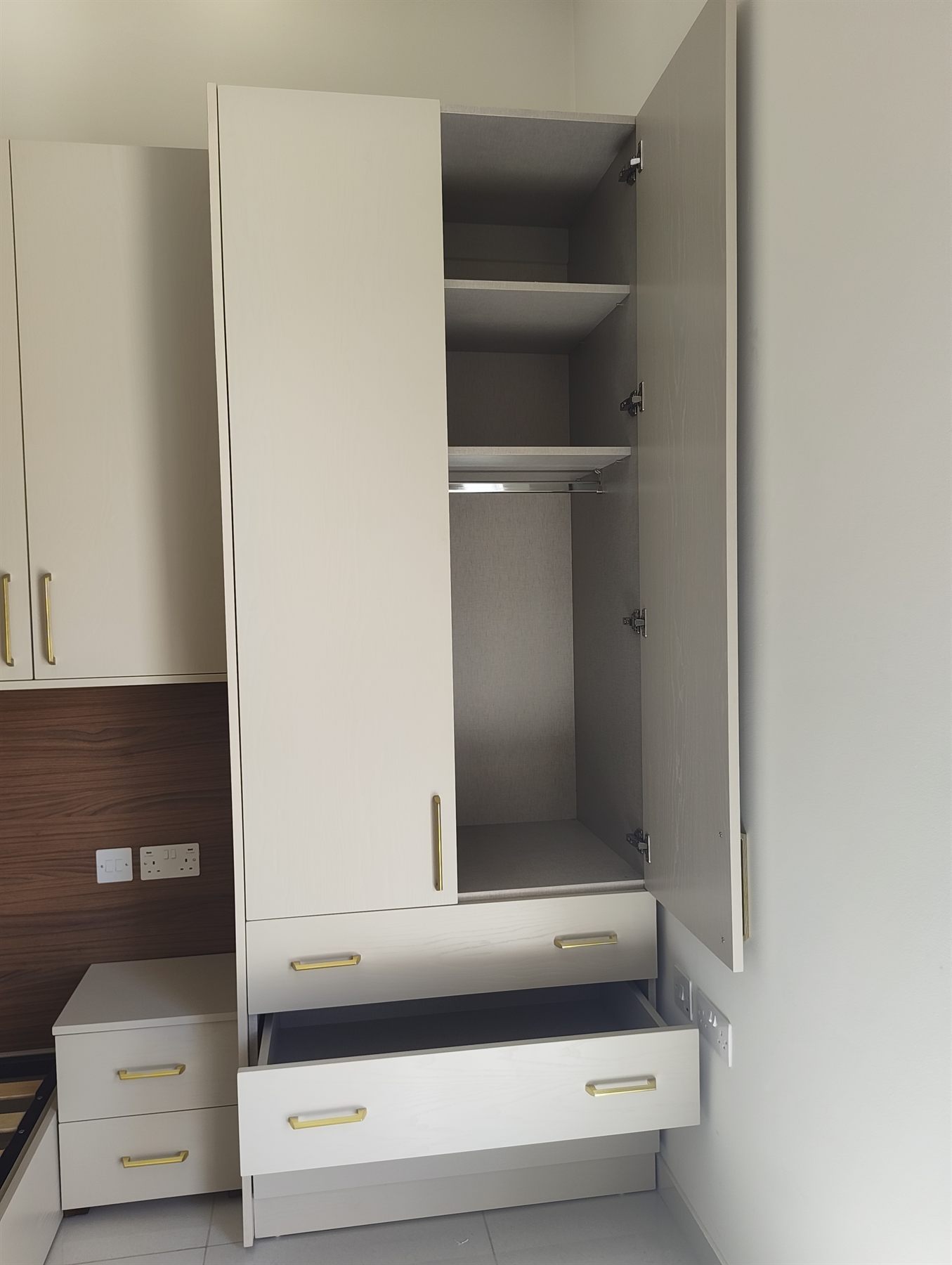 Overbed storage and fitted wardrobes